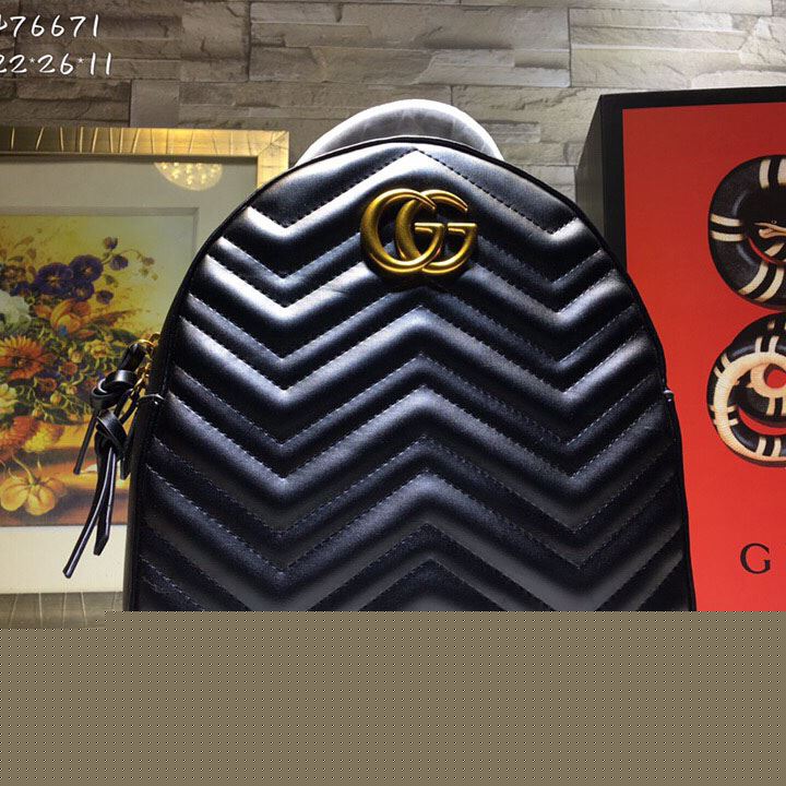 G*u*i backpacks